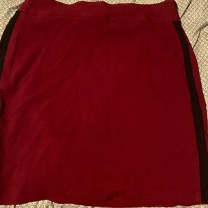 Skirt. Cranberry color with black side stripe.